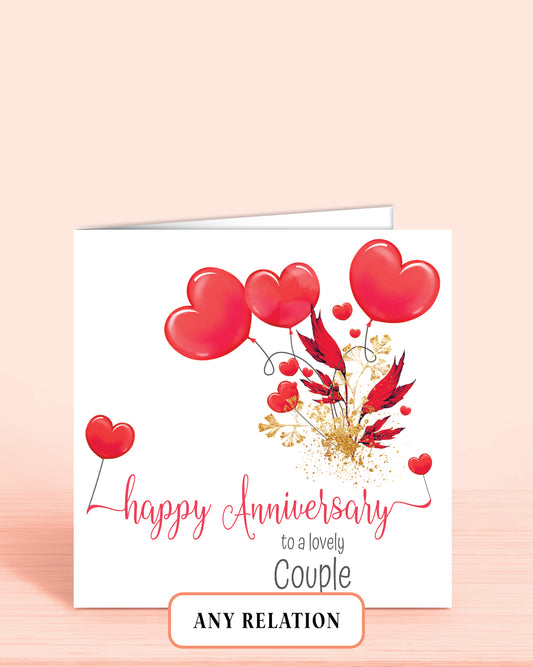 Greeting card with red hearts and floral hearts design, featuring the text 'Happy Anniversary to a lovely couple'.
