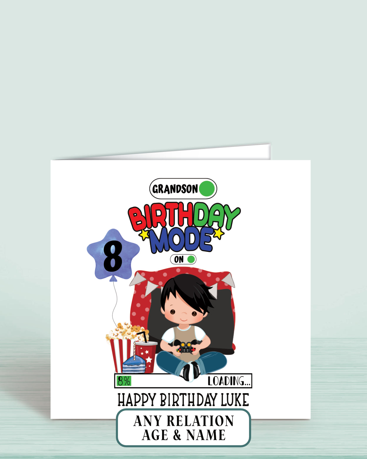 Grandson Gaming Birthday card with a black haired cartoon character boy and text reading: Grandson, Birthday Mode on, Happy Birthday (Name) and age 8 printed on a blue balloon