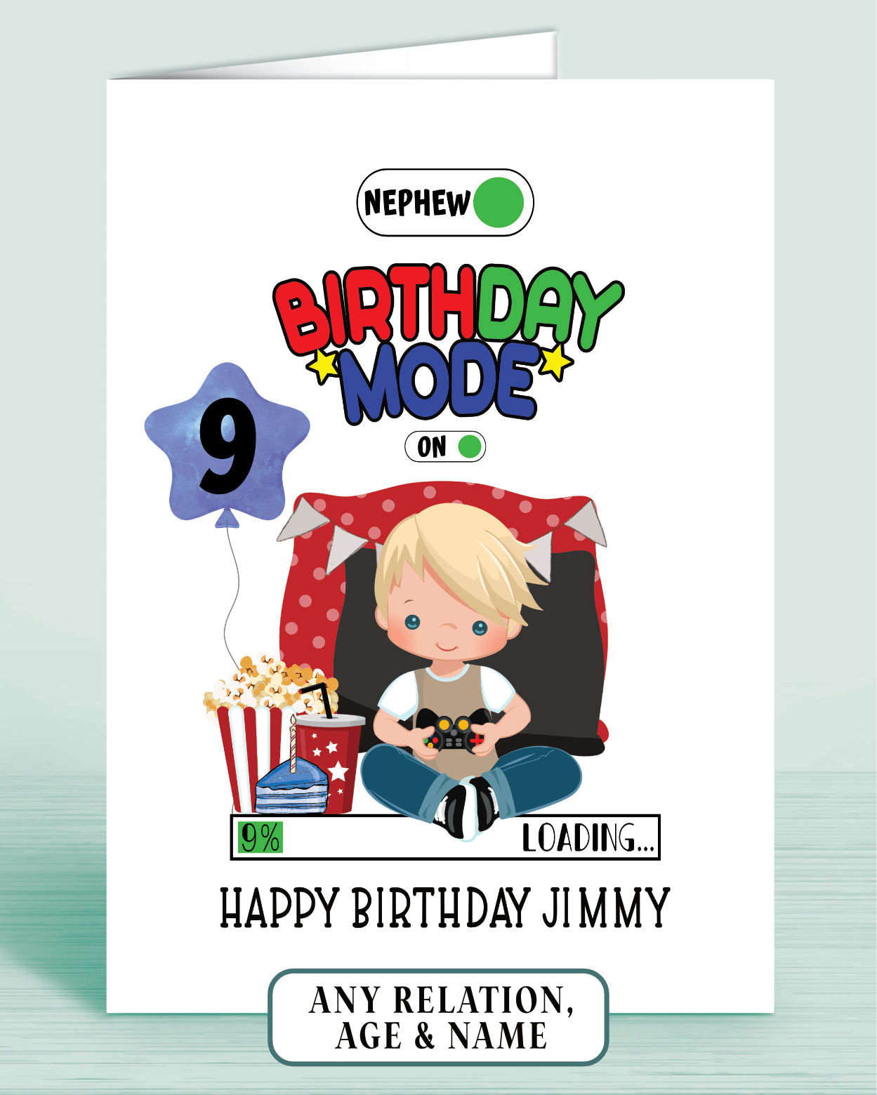 Birthday card with a cartoon boy with Blonde Hair, popcorn, and video game controller & a blue birthday balloon with age 9 as example.