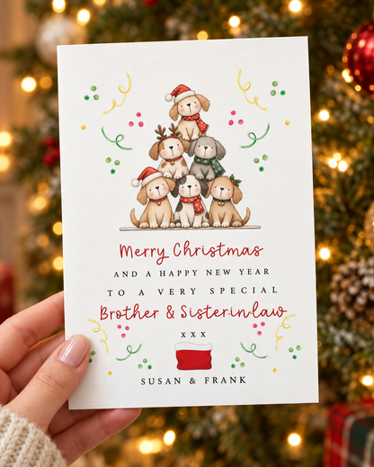 Brother & Sister-in-law Dog Lover Christmas card held in front of a lit Christmas tree [this image example was created using AI]