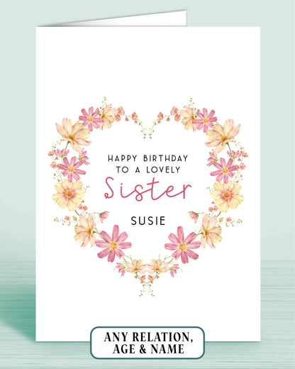 Personalised Pink and yellow floral wreath birthday card for a lovely Sister with floral design on a white background.