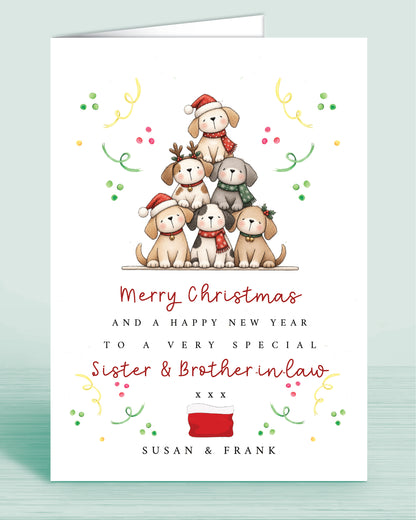 A Dog Lovers christmas card with a stack of christmas tree shaped Puppies and text underneath that reads: Merry Christmas and a happy new year to a very special sister & brother-in-law xxx - Names are optional.