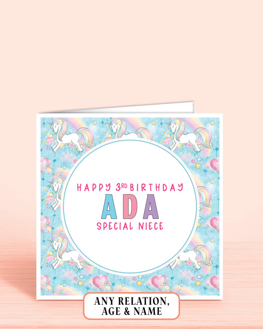 Personalized Niece birthday card with unicorns and rainbow on a light blue background