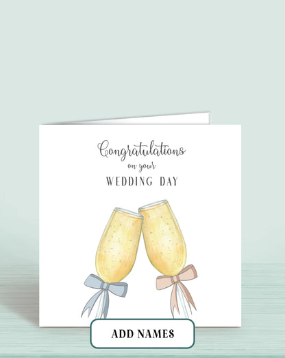 Wedding Card with Printed Champagne Glasses with Blue & Pink Bow & words Congratulations on your Wedding Day